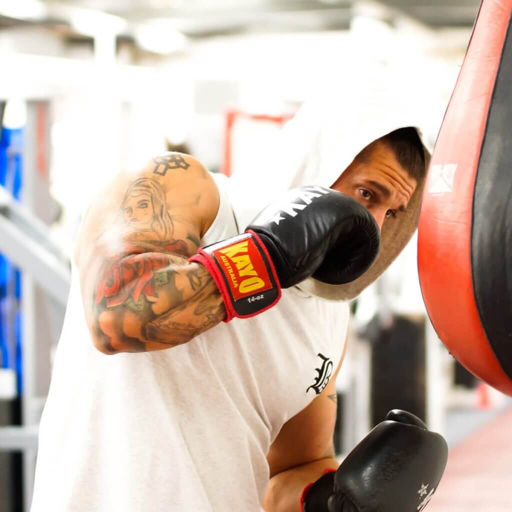 Grey sleeveless hooded vest gym wear by Berserker Apparel