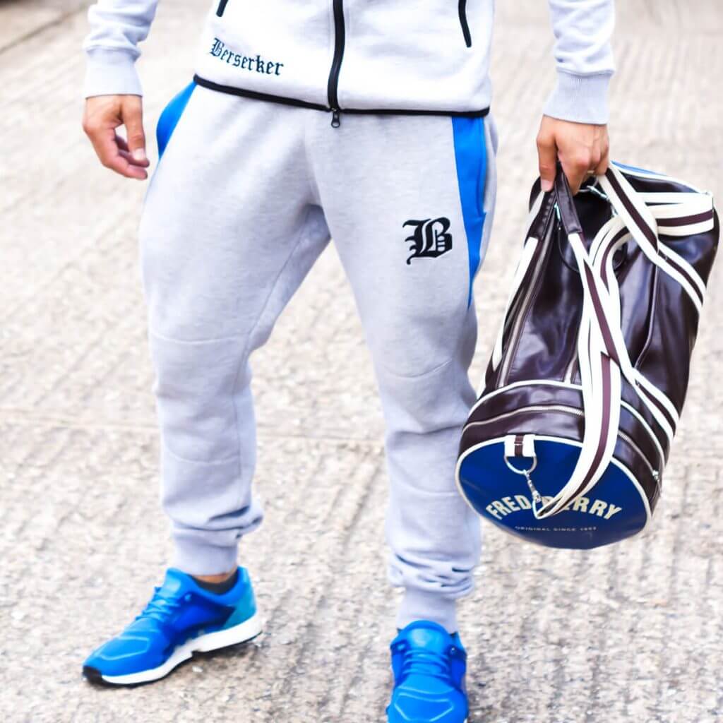 Tapered fit technical tracksuit bottoms in light grey and blue deigned to fit and look awesome for your gym sessions