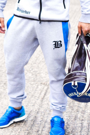 Tapered fit technical tracksuit bottoms in light grey and blue deigned to fit and look awesome for your gym sessions